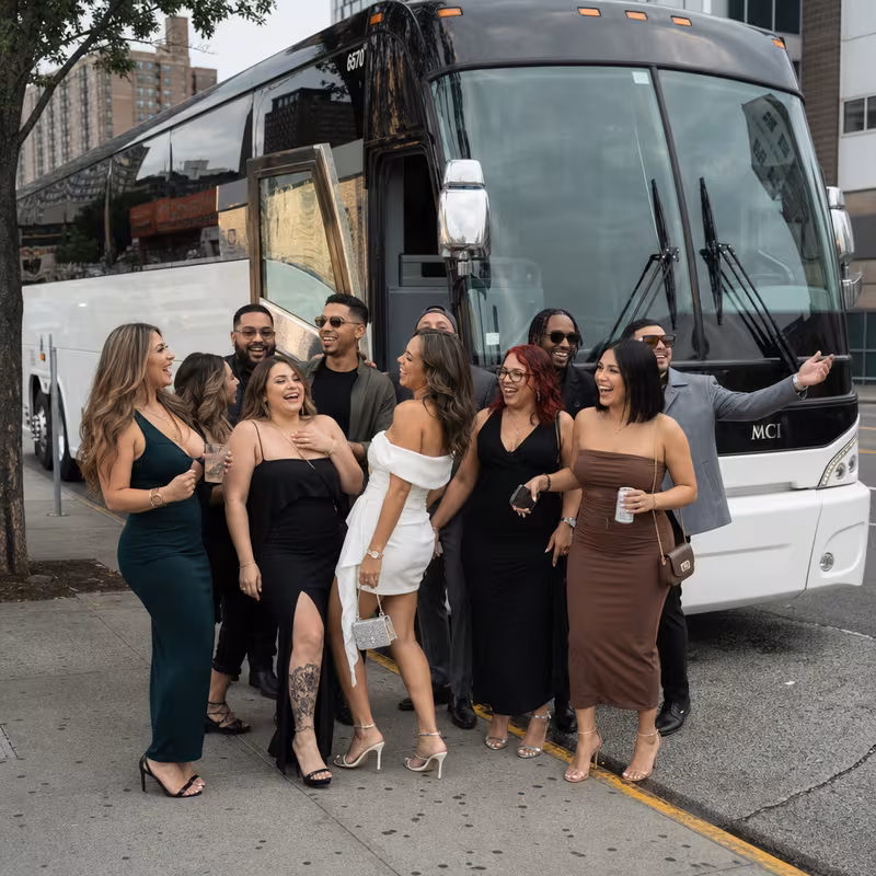 Passengers loading luggage while boarding an Bronx group shuttle