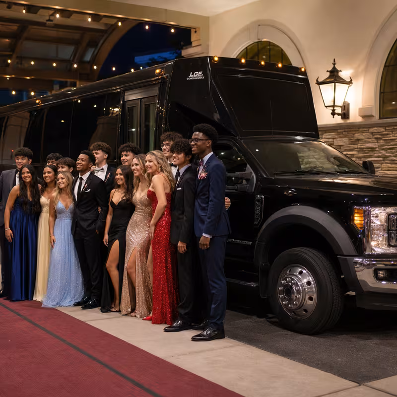 Party bus interior with wraparound leather seating and LED lighting in Bronx