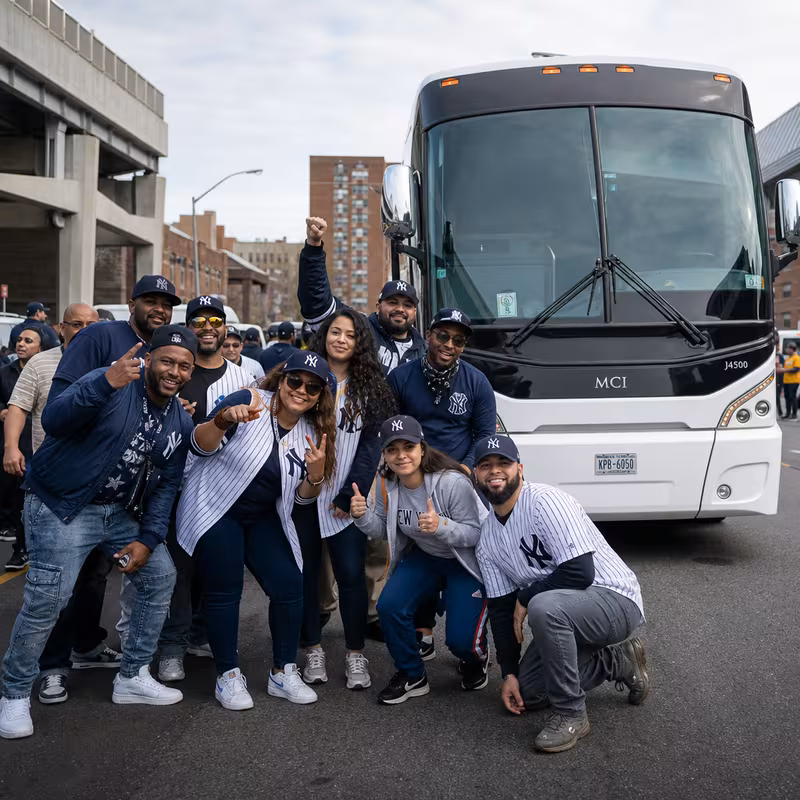 Passengers loading luggage while boarding an Bronx group shuttle